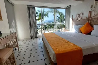 Cama o camas de una habitación en Condominio en zona turística