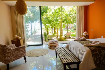 Cama o camas de una habitación en Hotel BG Wellness & Spa Boca del Río Veracruz