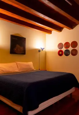 Cama o camas de una habitación en Casa Independencia Oaxaca, Loft histórico a 6 calles del zócalo con WiFi rápido