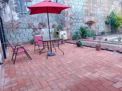 Un patio o zona al aire libre en Casa Independencia Oaxaca, Loft histórico a 6 calles del zócalo con WiFi rápido