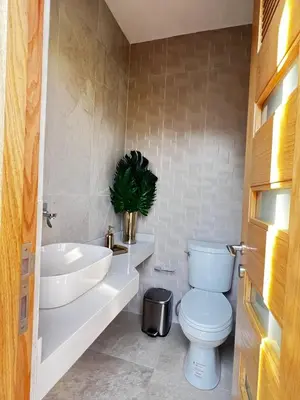 Un baño de Xhiara Hotel