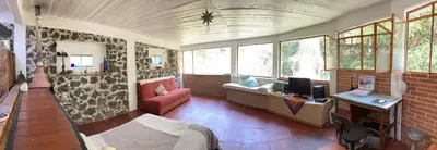 Una televisión o centro de entretenimiento en Loft panorámico en Tepoztlan