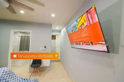Una televisión o centro de entretenimiento en Hermoso Apartamento para 2 personas, a 10 min en vehículo del Zócalo de Oaxaca