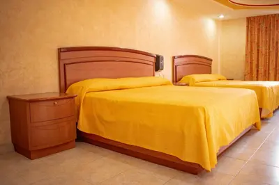 Cama o camas de una habitación en Auto Hotel Estrella del Sur