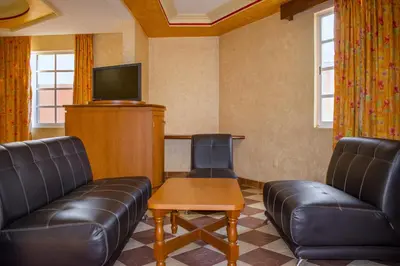 Una televisión o centro de entretenimiento en Auto Hotel Estrella del Sur