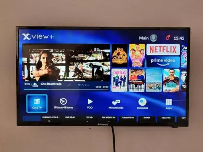 Una televisión o centro de entretenimiento en Departamento con Alberca