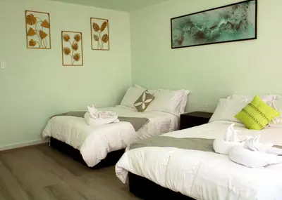 Cama o camas de una habitación en Departamento céntrico, amplio y nuevo cerca del Aeropuerto y GNP-Foro sol