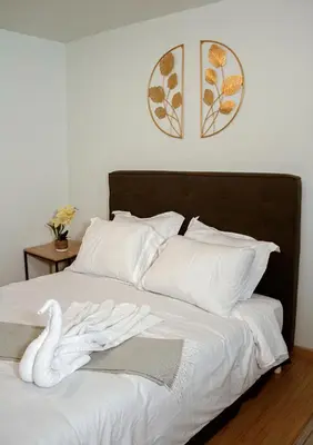 Cama o camas de una habitación en Departamento céntrico, amplio y nuevo cerca del Aeropuerto y GNP-Foro sol