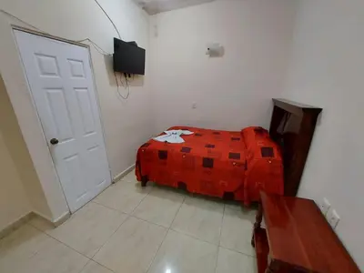 Cama o camas de una habitación en Hotel Juarez