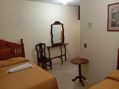 Cama o camas de una habitación en Hotel Juarez