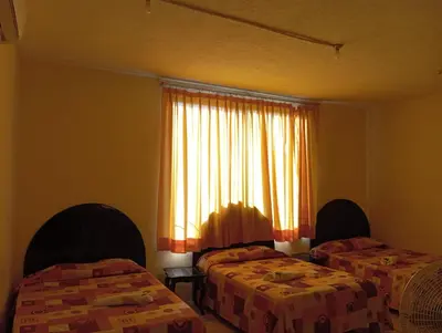 Cama o camas de una habitación en Hotel Juarez