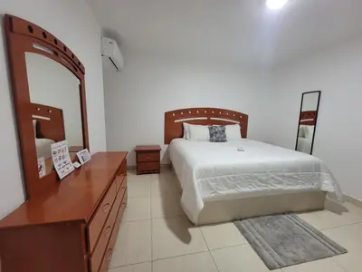 Cama o camas de una habitación en Hotel Paraiso Inn