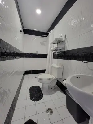 Un baño de Hotel Paraiso Inn