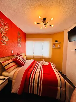 Cama o camas de una habitación en Hotel Los Diamantes