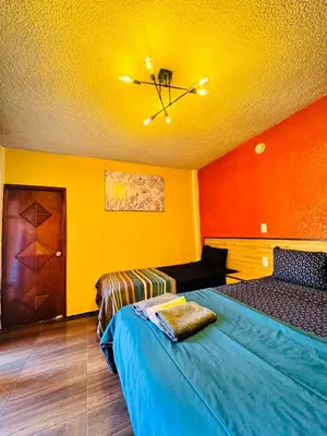 Cama o camas de una habitación en Hotel Diamantes