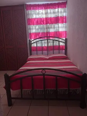 Cama o camas de una habitación en Un rincón en el pacífico