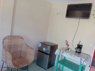Una televisión o centro de entretenimiento en Habitación de Manuel.. ac wifi óptico privada