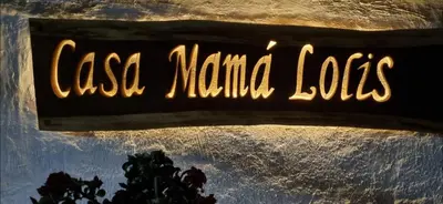 Certificado, premio, señal o documento que está expuesto en Casa Mamá Lolis