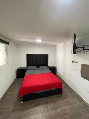 Cama o camas de una habitación en Casa palmera