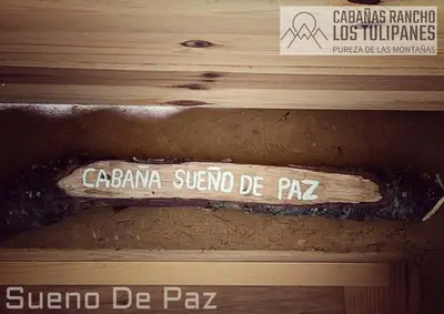 Certificado, premio, señal o documento que está expuesto en Cabanas Rancho Los Tulipanes - dream of peace
