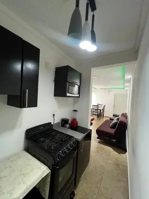 Una televisión o centro de entretenimiento en Departamento Acá-Love
