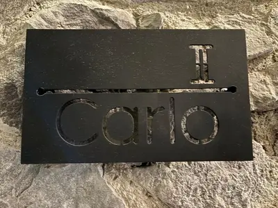 Certificado, premio, señal o documento que está expuesto en Castello di Carlo - Loft Carlo II
