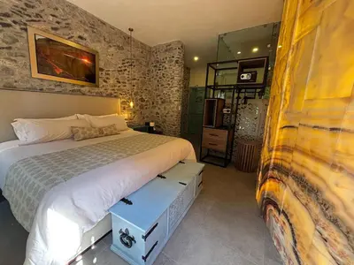 Cama o camas de una habitación en Castello di Carlo - Suite Carlo IV