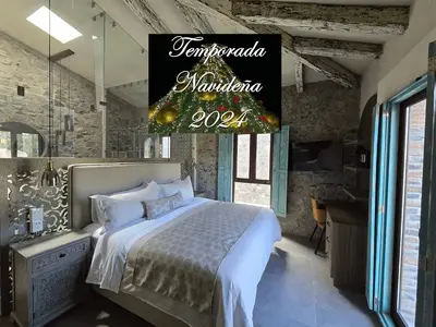 Cama o camas de una habitación en Castello di Carlo - Suite Carlo V