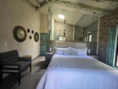 Cama o camas de una habitación en Castello di Carlo - Suite Carlo V