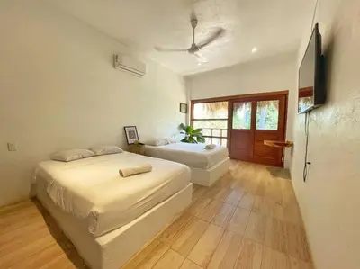 Cama o camas de una habitación en Mangal Punta Zicatela