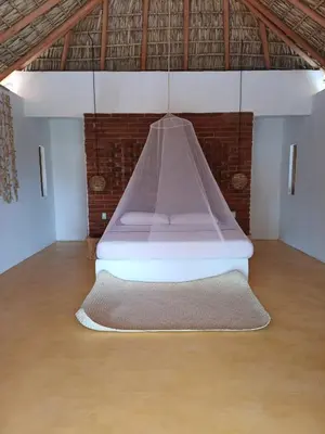 Cama o camas de una habitación en Cabañas Mizontle