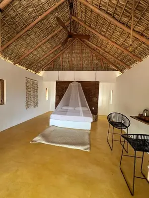 Cama o camas de una habitación en Cabañas Mizontle