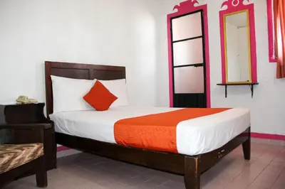 Cama o camas de una habitación en Hotel Huautla de Oaxaca