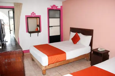 Cama o camas de una habitación en Hotel Huautla de Oaxaca