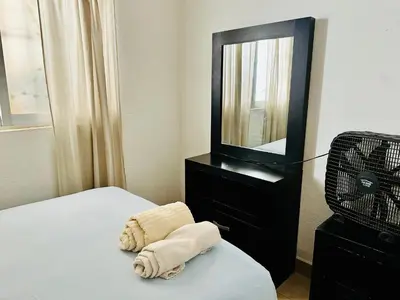 Cama o camas de una habitación en Casita Iluminada