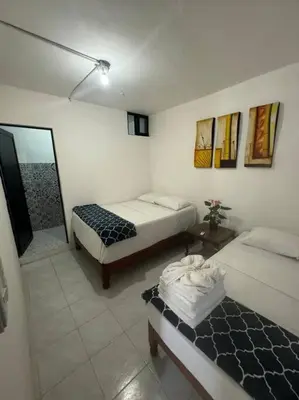 Cama o camas de una habitación en Mini depa Cocoloft- a solo 1 cuadra de la playa