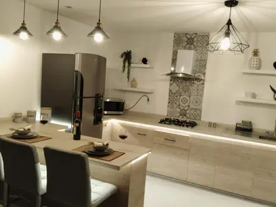 Una cocina o zona de cocina en Habitación Exclusiva King Size con Alberca Climatizada