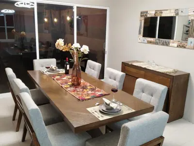 Una televisión o centro de entretenimiento en Habitación Exclusiva King Size con Alberca Climatizada