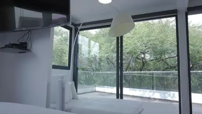 Cama o camas de una habitación en Suites del Valle