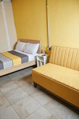 Cama o camas de una habitación en Kali Oaxaca Hostel