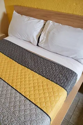 Cama o camas de una habitación en Kali Oaxaca Hostel