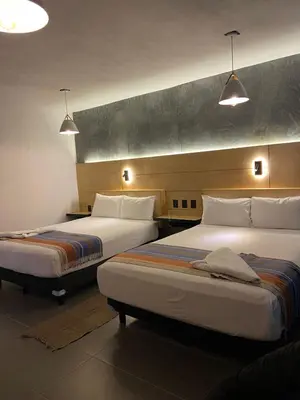 Cama o camas de una habitación en Hotel Aeropuerto Tuxtla Gutierrez Ernesto Garcia