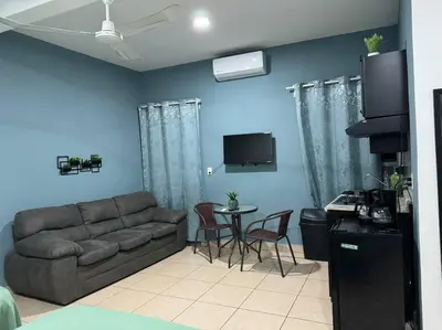 Una televisión o centro de entretenimiento en Loft Brisa Del Mar #9