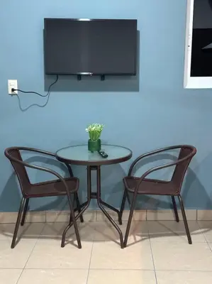 Una televisión o centro de entretenimiento en Loft Brisa Del Mar #9