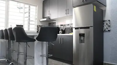 Una cocina o zona de cocina en Comodo apartamento de 3 habitaciones, a 10 min en vehiculo del Zocalo de Oaxaca
