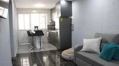 Una cocina o zona de cocina en Comodo apartamento de 3 habitaciones, a 10 min en vehiculo del Zocalo de Oaxaca