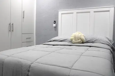 Cama o camas de una habitación en Comodo apartamento de 3 habitaciones, a 10 min en vehiculo del Zocalo de Oaxaca