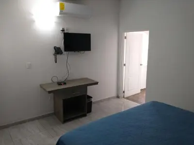 Una televisión o centro de entretenimiento en Villa Salvatore