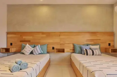 Cama o camas de una habitación en Casa Boutique Peñasco Oaxaca