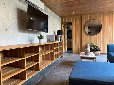 Una televisión o centro de entretenimiento en Nabani Condominios T3